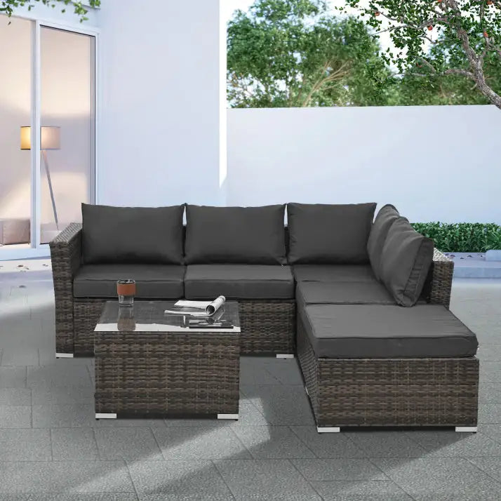 Patio Furniture, Outdoor Furniture, Seasonal PE Wicker Furniture, 4 Set Wicker Furniture With Tempered Glass Coffee Table sectional sofa with dark cushions and glass table