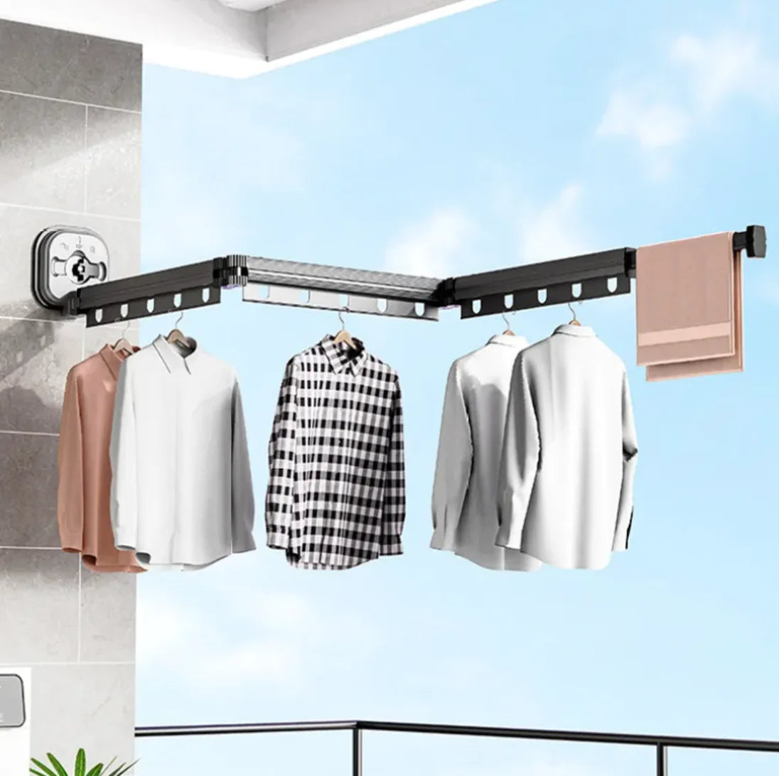 Retractable Aluminum Suction Cup Clothes Hanger with multiple slots and foldable arms for balcony or bathroom drying space-saving use