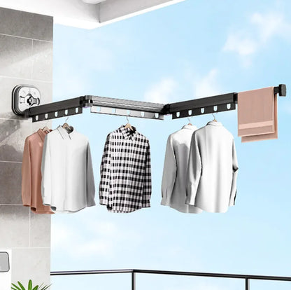 Retractable Aluminum Suction Cup Clothes Hanger with multiple slots and foldable arms for balcony or bathroom drying space-saving use