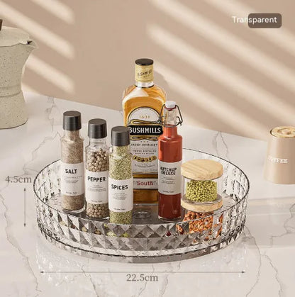 Kitchen Home Multi-function Rotating Storage Box in transparent design holding assorted spices and condiments on marble surface