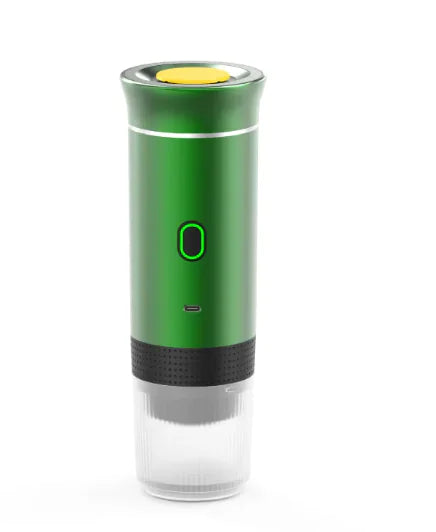 Wireless Capsule Coffee Maker in green with yellow top button and illuminated power indicator on white background