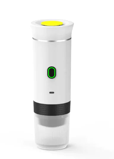 Wireless Capsule Coffee Maker in white with black grip, yellow top button, and glowing green power icon on white background